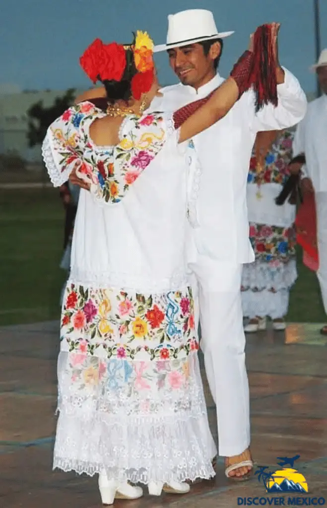 Traditional Yucatan clothing, blending indigenous heritage with Spanish influence, includes the women’s 'Terno' with an embroidered blouse and skirt, and the men’s 'mestizo' attire with white cotton pants, shirt, and wide-brimmed hat. Vibrant colors in women’s clothing reflect cultural pride, while men’s outfits remain elegant and ceremonial. These garments, worn during festivities like Hanal Pixan, preserve Yucatan’s identity and ancestral traditions.